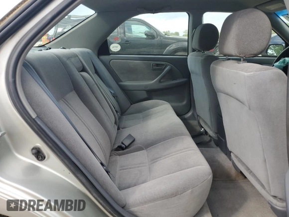 2000 Toyota Camry CE z VIN 4T1BG22K9YU653036, wystawiony jako Copart lot #55363475 z przebiegiem 84 258 mil mil oraz Szkoda całkowita • Salvage title. Historia ofert i sprzedaży dostępna na DreamBid. Obrazek 10.