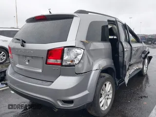 2016 Dodge Journey SXT with VIN 3C4PDDBG7GT173158, listed as a IAAI auction lot 42020182 with 159,136 mi miles. Bid and sale history available at carsss.com. Image 4.