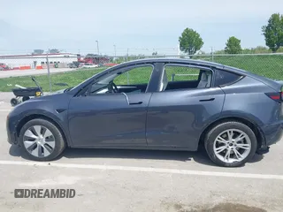 2023 Tesla Model Y Long Range z VIN 7SAYGDEE1PA158661, wystawiony jako IAAI lot #41983897 z przebiegiem 20 176 mil mil oraz . Historia ofert i sprzedaży dostępna na DreamBid. Obrazek 15.