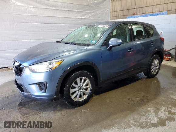 2015 Mazda CX-5 Sport with VIN JM3KE4BY9F0552942, listed as a Copart auction lot 54750245 with 129,700 mi miles and Salvage title. Bid and sale history available at DreamBid. Image 1.