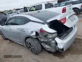 2016 Nissan Maxima SL with VIN 1N4AA6AP2GC386239, listed as a IAAI auction lot 41871290 with 175,941 mi miles and . Bid and sale history available at DreamBid. Image 3.
