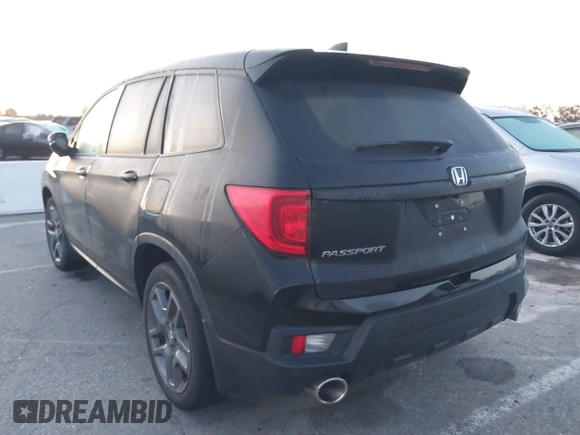 2022 Honda Passport EX-L with VIN 5FNYF7H53NB005762, listed as a IAAI auction lot 41824602 with 28,104 mi miles and . Bid and sale history available at carsss.com. Image 3.