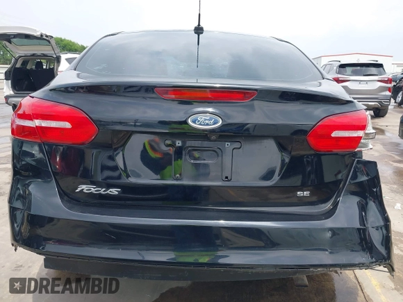 2018 Ford Focus SE with VIN 1FADP3F22JL311975, listed as a IAAI auction lot 41934856 with 68,974 mi miles. Bid and sale history available at carsss.com. Image 19.
