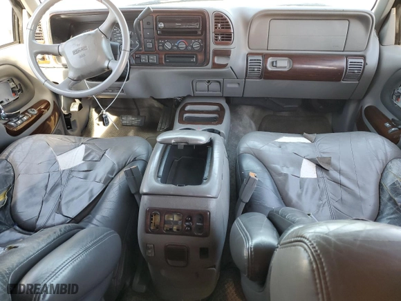 2000 GMC Denali with VIN 1GKEK13R8YR109690, listed as a Copart auction lot 76165584 with 153,366 mi miles and Salvage Title. Bid and sale history available at carsss.com. Image 8.
