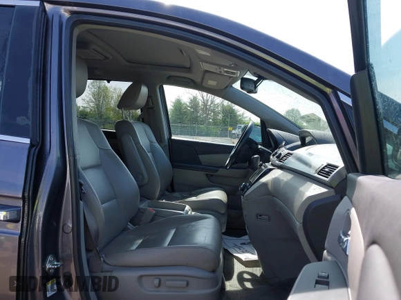 2015 Honda Odyssey EX-L with VIN 5FNRL5H68FB066570, listed as a IAAI auction lot 42092446 with 104,523 mi miles and . Bid and sale history available at DreamBid. Image 5.