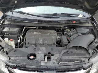 2014 Honda Odyssey Touring z VIN 5FNRL5H91EB063390, wystawiony jako Copart lot #54482545 z przebiegiem Nie podano mil oraz Szkoda całkowita • Salvage title. Historia ofert i sprzedaży dostępna na DreamBid. Obrazek 12.