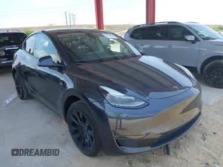 2024 Tesla Model Y Long Range z VIN 7SAYGDEE7RA229591, wystawiony jako IAAI lot #42194044 z przebiegiem 22 866 mil mil oraz . Historia ofert i sprzedaży dostępna na DreamBid. Obrazek 1.