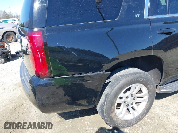 2018 Chevrolet Tahoe LT z VIN 1GNSCBKC7JR254859, wystawiony jako IAAI lot #41620074 z przebiegiem 124 714 mil mil oraz . Historia ofert i sprzedaży dostępna na DreamBid. Obrazek 17.