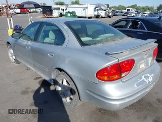 2004 Oldsmobile Alero GL1 z VIN 1G3NL52E54C196878, wystawiony jako IAAI lot #42357662 z przebiegiem Nie podano mil oraz . Historia ofert i sprzedaży dostępna na DreamBid. Obrazek 3.