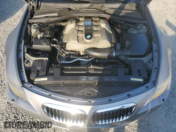 2004 BMW 6 Series 645Ci z VIN WBAEH73434B190924, wystawiony jako Copart lot #74318214 z przebiegiem 121 317 mil mil oraz Czysty tytuł • Clean title. Historia ofert i sprzedaży dostępna na DreamBid. Obrazek 11.