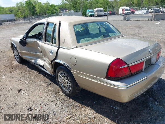 2000 Mercury Grand Marquis GS z VIN 2MEFM74W3YX610461, wystawiony jako IAAI lot #42162767 z przebiegiem 181 400 mil mil oraz . Historia ofert i sprzedaży dostępna na DreamBid. Obrazek 3.