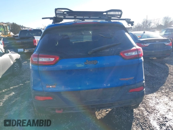 2017 Jeep Cherokee Trailhawk with VIN 1C4PJMBS4HW602362, listed as a IAAI auction lot 41337004 with 139,926 mi miles and . Bid and sale history available at DreamBid. Image 16.