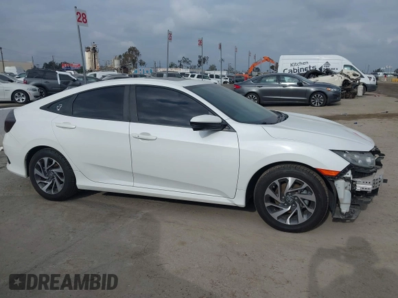 2018 Honda Civic EX with VIN 2HGFC2F74JH566761, listed as a IAAI auction lot 42117730 with 73,946 mi miles and . Bid and sale history available at DreamBid. Image 14.