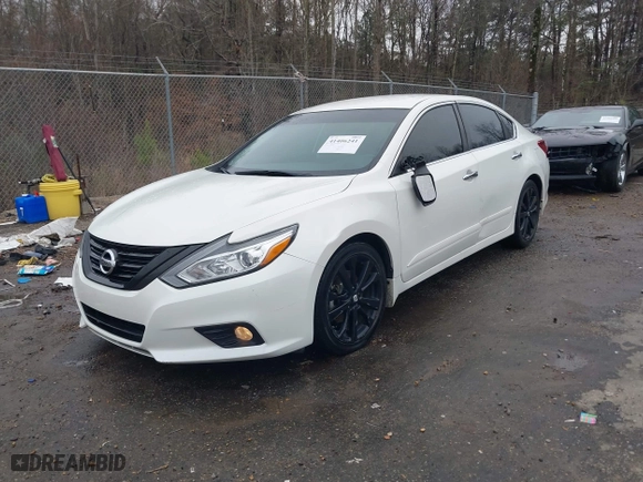 2018 Nissan Altima 2.5 SL with VIN 1N4AL3AP3JC163577, listed as a IAAI auction lot 41406241 with 138,214 mi miles. Bid and sale history available at carsss.com. Image 17.
