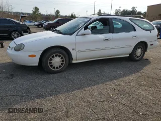 1999 Ford Taurus SE z VIN 1FAFP58S0XA272714, wystawiony jako Copart lot #48966215 z przebiegiem 255 885 mil mil oraz Szkody całkowita. Historia ofert i sprzedaży dostępna na DreamBid. Obrazek 1.
