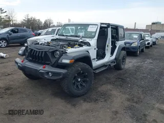2021 Jeep Wrangler Unlimited Sport S with VIN 1C4HJXDN0MW612698, listed as a IAAI auction lot 41649323 with 22,539 mi miles and . Bid and sale history available at DreamBid. Image 17.