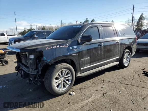2021 GMC Yukon XL SLT with VIN 1GKS1GKD2MR243619, listed as a Copart auction lot 84262484 with 125,419 mi miles and Salvage Title. Bid and sale history available at carsss.com. Image 1.