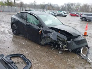 2023 Tesla Model Y Performance z VIN 7SAYGDEF0PF715703, wystawiony jako IAAI lot #41869780 z przebiegiem 32 220 mil mil oraz . Historia ofert i sprzedaży dostępna na DreamBid. Obrazek 1.