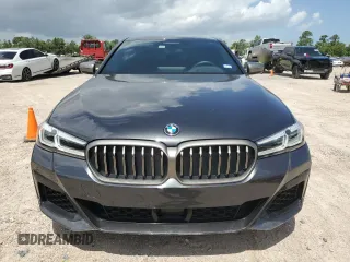 2022 BMW 5 Series M550i xDrive z VIN WBA13BK09NCJ00508, wystawiony jako Copart lot #58077634 z przebiegiem Nie podano mil oraz . Historia ofert i sprzedaży dostępna na DreamBid. Obrazek 5.