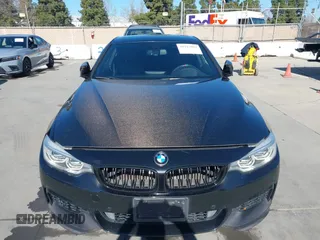 2015 BMW 4 Series 435i xDrive z VIN WBA3R5C59FK189457, wystawiony jako IAAI lot #41717989 z przebiegiem 116 402 mil mil oraz . Historia ofert i sprzedaży dostępna na DreamBid. Obrazek 6.