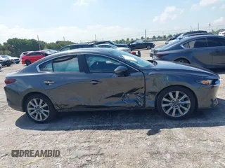 2023 Mazda 3 S Preferred with VIN 3MZBPACM8PM361196, listed as a IAAI auction lot 41940018 with 49,759 mi miles and . Bid and sale history available at DreamBid. Image 14.