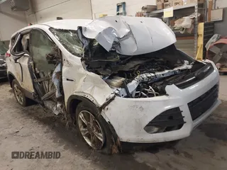 2013 Ford Escape SE with VIN 1FMCU9GX8DUC68815, listed as a IAAI auction lot 42028850 with 83,297 mi miles and . Bid and sale history available at DreamBid. Image 1.