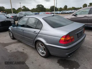 2005 BMW 3 Series 330i with VIN WBAEV53455KM42056, listed as a Copart auction lot 75910624 with 136,892 mi miles and Salvage Title. Bid and sale history available at carsss.com. Image 2.