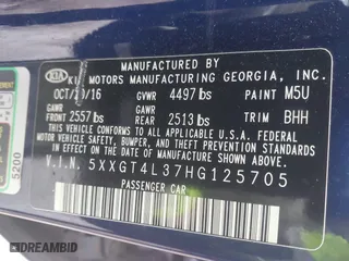 2017 Kia Optima LX with VIN 5XXGT4L37HG125705, listed as a IAAI auction lot 41542959 with 106,819 mi miles. Bid and sale history available at carsss.com. Image 9.
