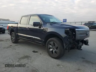 2023 Ford F-150 Lightning Pro with VIN 1FTVW1EV1PWG16263, listed as a Copart auction lot 54439535 with 12,023 mi miles and Salvage Title. Bid and sale history available at DreamBid. Image 4.