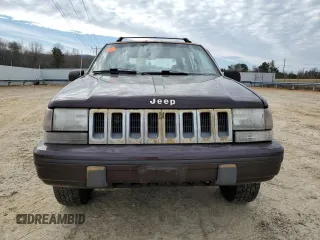 1993 Jeep Grand Wagoneer z VIN 1J4GZ88Y6PC711184, wystawiony jako Copart lot #46785895 z przebiegiem 280 127 mil mil oraz Czysty tytuł • Clean title. Historia ofert i sprzedaży dostępna na DreamBid. Obrazek 5.
