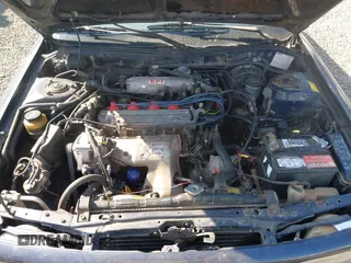 1991 Toyota Camry z VIN JT2SV21W3M0389983, wystawiony jako IAAI lot #42448678 z przebiegiem 312 034 mil mil oraz . Historia ofert i sprzedaży dostępna na DreamBid. Obrazek 10.