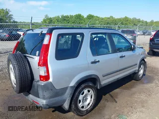 2006 Honda CR-V LX z VIN SHSRD78596U445523, wystawiony jako IAAI lot #42212230 z przebiegiem 141 228 mil mil oraz . Historia ofert i sprzedaży dostępna na DreamBid. Obrazek 4.