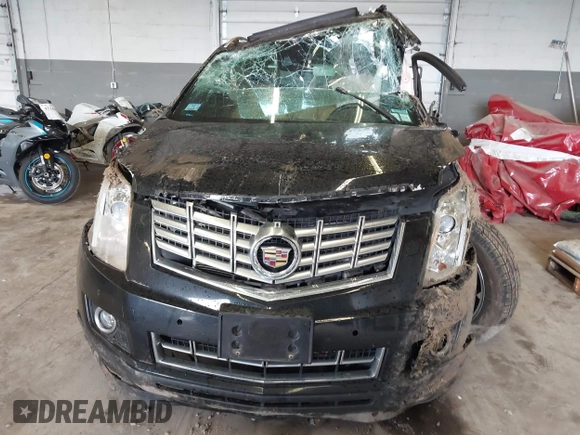 2014 Cadillac SRX Premium Collection with VIN 3GYFNGE35ES636852, listed as a IAAI auction lot 42283604 with 167,983 mi miles and . Bid and sale history available at DreamBid. Image 13.