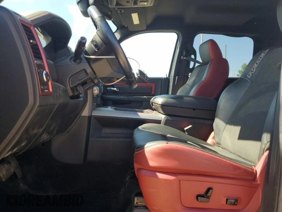 2017 Ram 1500 Rebel z VIN 1C6RR7YT4HS531035, wystawiony jako Copart lot #57652345 z przebiegiem 130 013 mil mil oraz Czysty tytuł • Clean title. Historia ofert i sprzedaży dostępna na DreamBid. Obrazek 7.