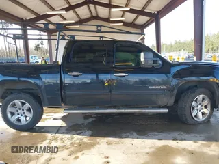 2012 GMC Sierra 1500 SLT with VIN 3GTP2WE75CG289247, listed as a IAAI auction lot 41871709 with 153,177 mi miles and . Bid and sale history available at DreamBid. Image 13.