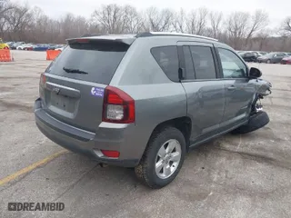 2014 Jeep Compass Sport with VIN 1C4NJCBA6ED551995, listed as a IAAI auction lot 41539536 with 185,130 mi miles. Bid and sale history available at carsss.com. Image 4.