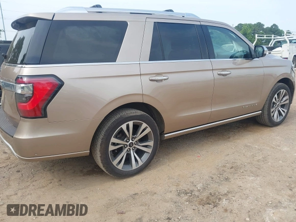 2020 Ford Expedition Platinum with VIN 1FMJU1MT6LEA51900, listed as a IAAI auction lot 42265591 with 70,022 mi miles and . Bid and sale history available at DreamBid. Image 4.