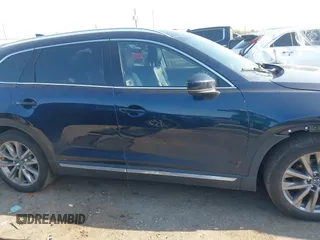 2020 Mazda CX-9 Grand Touring with VIN JM3TCADY0L0422548, listed as a IAAI auction lot 41839601 with 116,952 mi miles and . Bid and sale history available at DreamBid. Image 13.