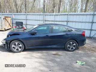 2021 Honda Civic LX z VIN 19XFC2F65ME000324, wystawiony jako IAAI lot #42137375 z przebiegiem 78 473 mil mil oraz . Historia ofert i sprzedaży dostępna na DreamBid. Obrazek 14.