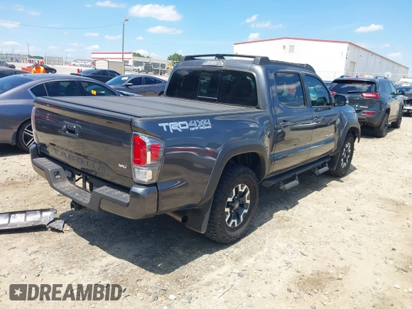 2023 Toyota Tacoma SR with VIN 3TMCZ5AN9PM553246, listed as a IAAI auction lot 42201812 with 20,907 mi miles and . Bid and sale history available at DreamBid. Image 4.