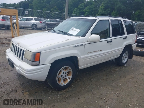 1996 Jeep Grand Cherokee Limited z VIN 1J4GZ78YXTC191527, wystawiony jako IAAI lot #42352616 z przebiegiem 325 927 mil mil oraz . Historia ofert i sprzedaży dostępna na DreamBid. Obrazek 18.