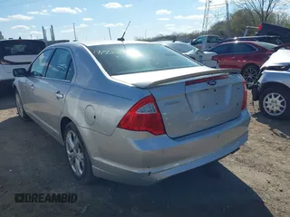 2012 Ford Fusion SE with VIN 3FAHP0HA9CR210330, listed as a IAAI auction lot 41988499 with 165,395 mi miles and . Bid and sale history available at DreamBid. Image 3.