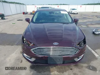 2017 Ford Fusion Titanium z VIN 3FA6P0K94HR271307, wystawiony jako IAAI lot #42595411 z przebiegiem 100 344 mil mil oraz . Historia ofert i sprzedaży dostępna na DreamBid. Obrazek 13.