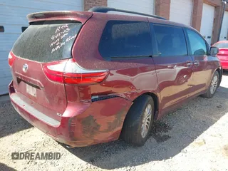 2015 Toyota Sienna XLE with VIN 5TDYK3DC3FS666438, listed as a IAAI auction lot 42117980 with 121,084 mi miles and . Bid and sale history available at DreamBid. Image 4.