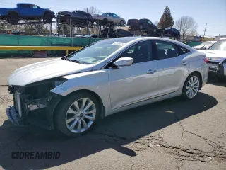 2014 Hyundai Azera Limited z VIN KMHFH4JG0EA410865, wystawiony jako Copart lot #50583525 z przebiegiem Nie podano mil oraz Szkoda całkowita • Salvage title. Historia ofert i sprzedaży dostępna na DreamBid. Obrazek 1.