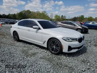 2022 BMW 5 Series 540i xDrive with VIN WBA73BJ06NWX59060, listed as a Copart auction lot 52142645 with 33,678 mi miles and Salvage title. Bid and sale history available at DreamBid. Image 4.
