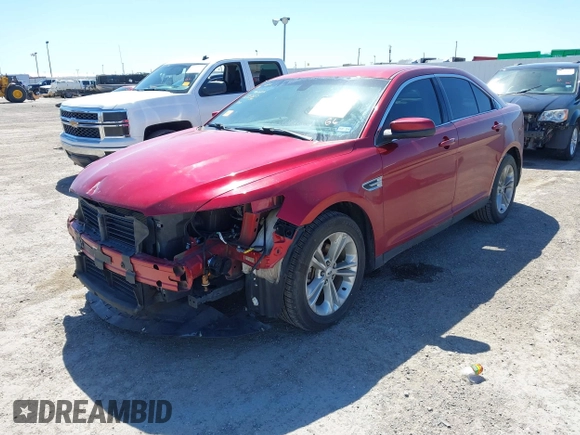 2013 Ford Taurus SEL with VIN 1FAHP2E8XDG231807, listed as a IAAI auction lot 41774166 with 120,639 mi miles and . Bid and sale history available at carsss.com. Image 2.