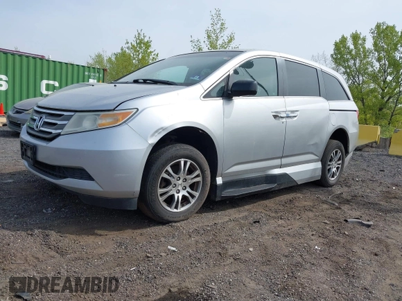 2011 Honda Odyssey EX-L with VIN 5FNRL5H61BB067456, listed as a IAAI auction lot 42131999 with 150,358 mi miles and . Bid and sale history available at carsss.com. Image 20.
