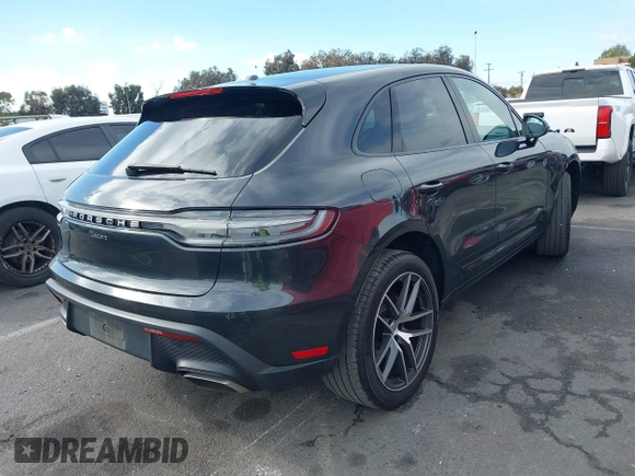 2023 Porsche Macan with VIN WP1AA2A51PLB10005, listed as a IAAI auction lot 41414974 with 15,955 mi miles. Bid and sale history available at carsss.com. Image 4.