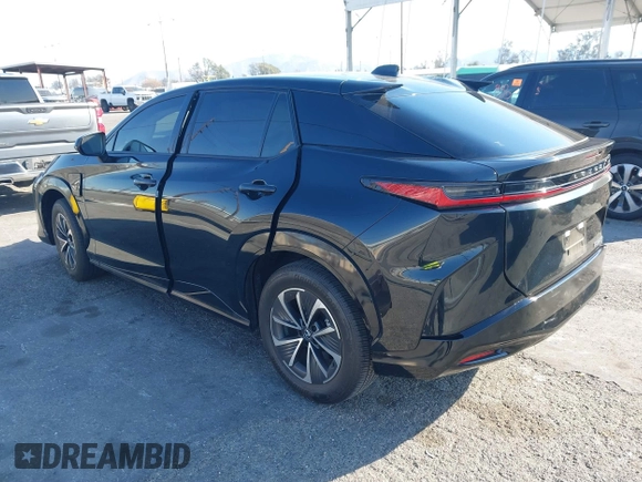 2024 Lexus RZ 300e Premium z VIN JTJABABB1RA004615, wystawiony jako IAAI lot #41310232 z przebiegiem 9 622 mil mil oraz . Historia ofert i sprzedaży dostępna na DreamBid. Obrazek 3.